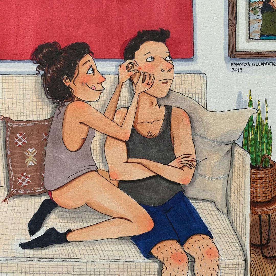 woman pricking her man's blackheads 