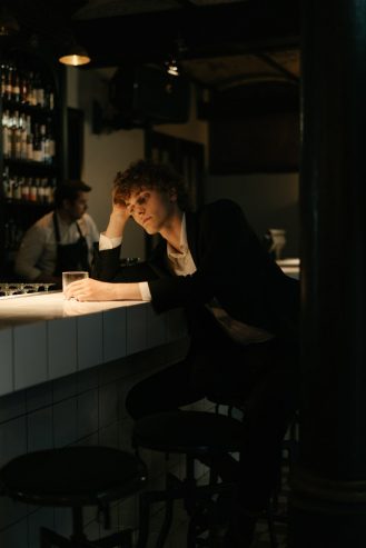 man alone in a bar 