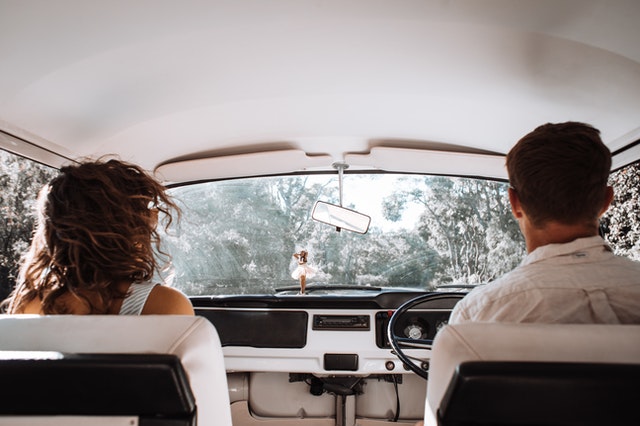 couple traveling in a car together
